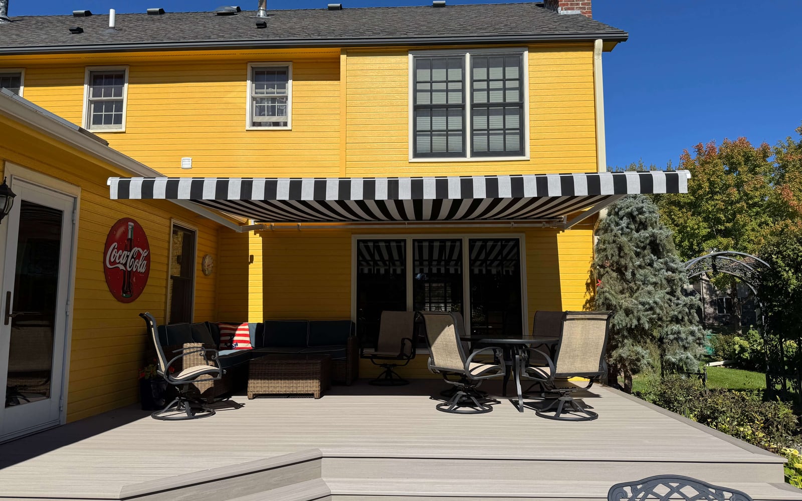 Retractable awning installed over a Minnesota patio